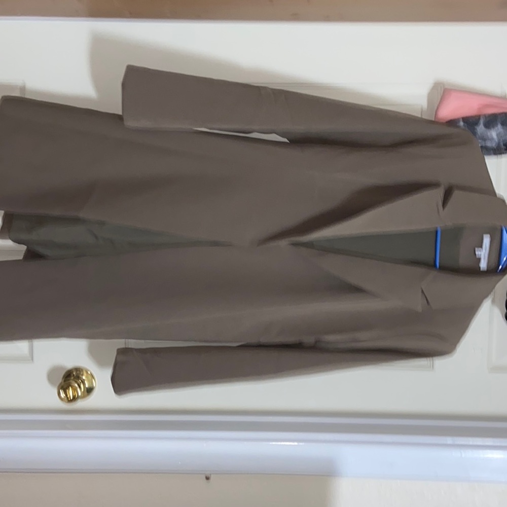 Used once. Dark brown/beige trench coat